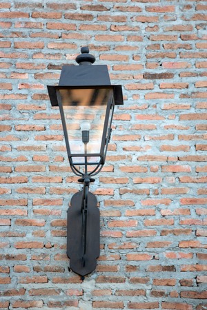 Lantern on a wallの写真素材
