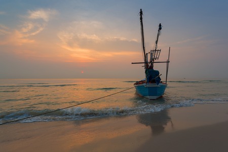 Fisherman Boat with sunrise sky environment,huahin thailandの写真素材