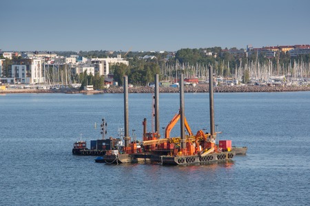 Floating dredging platform on the seaの写真素材
