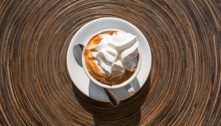 Black coffee with whipcream top viewの写真素材