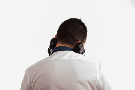 man deejay back against white backgroundの写真素材