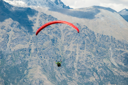 Paragliding over the city of Bernal, New Zealand