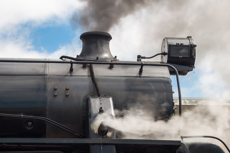 Classic old steam train in the stationの写真素材