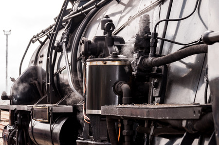 Classic old steam train in the stationの写真素材