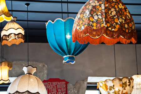 old style colored lamps hanging from the ceiling