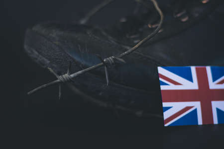 United Kingdom army, military boots flag United Kingdom and Barbed Wire, military conceptの写真素材