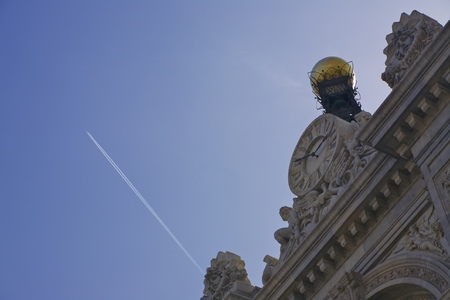 España facade. Trace of the plane and Madrid building facade.の写真素材