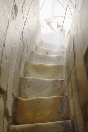 Old marble steps. Pisa tower worn marble stairwayの写真素材