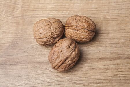 Walnut on wooden table. Healthy food and snack.の写真素材