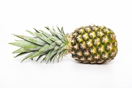 Ripe pineapple isolated on white background.