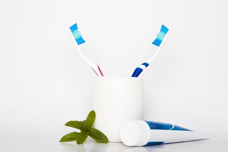 toothbrush with toothpaste on white backgroundの写真素材