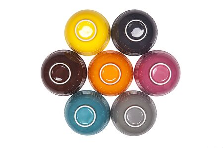 Colorful ceramic bowls on white background.