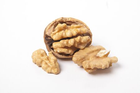 Walnut on white table. Healthy food and snack.