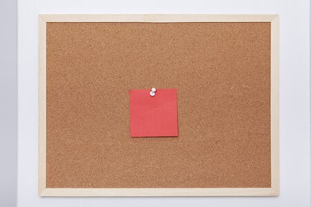 Colorful note papers on cork board (bulletin board).の写真素材