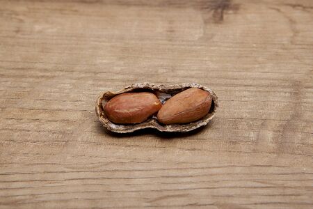 Peanut on wooden table.Healthy food and snack.