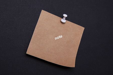 Colorful note papers on black background.の写真素材
