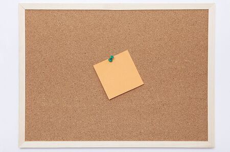 Colorful note papers on cork board (bulletin board).の写真素材