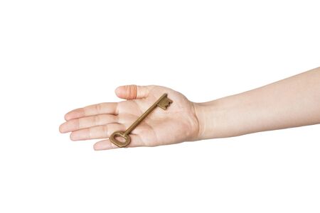 Young female real estate agent is giving the house key.の写真素材