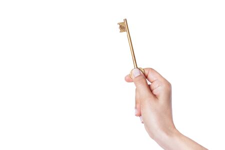 Young female real estate agent is giving the house key.の写真素材