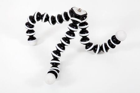 Tripod in white isolated background.