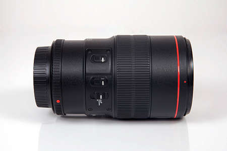 Photo camera lens isolated on white background.