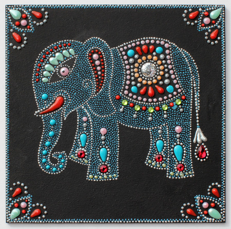 authentic original handmade craftwork painting elephant in ukrainian traditional style with jewelry stones on black backgroundの写真素材