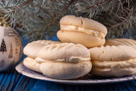 Traditional american Christmas cookies biscuits Melting Moments on deep blue background. Christmas...
