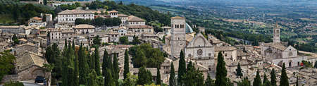 Panoramic view of Assisi Cathedral of San Rufino and Basilica di Santa Chiara, Umbria, Italyの写真素材