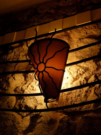 Night lantern on a stone wallの写真素材