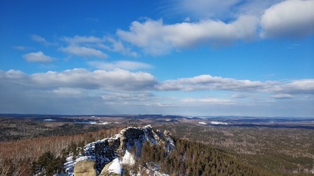 Winter landscapes in the Urals forest trees on a sunny dayの写真素材
