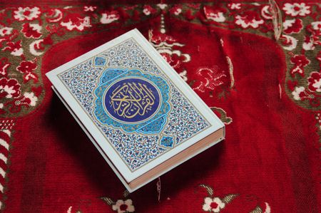 Koran on praying carpetの写真素材