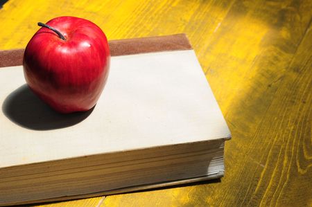 Apple and bookの写真素材