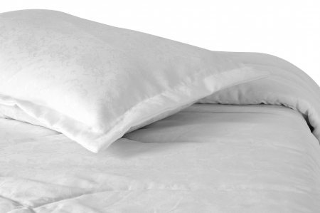 Bed against white background 
