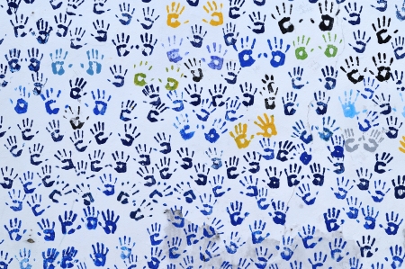 Hand prints on a wall の写真素材