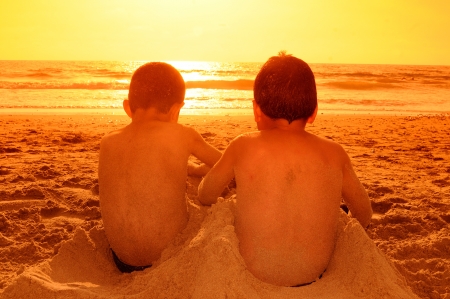 Two kids in the beachの写真素材