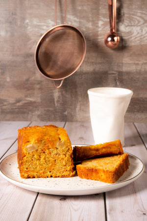 Pumpkin cake on a wooden background. Selective focus.