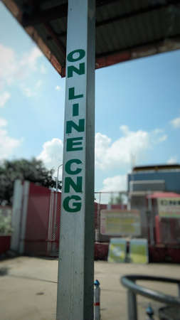 sign of online cng Gas on the pole. Sign board of cng pump.の写真素材