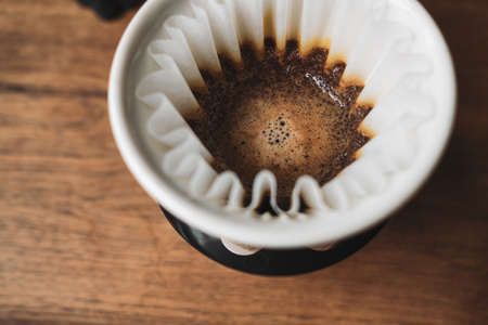 barista dripping coffee and slow coffee wooden bar styleの写真素材