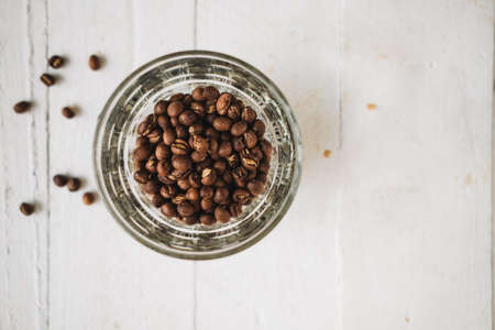 Premium Roasted coffee beans on backgroundの写真素材