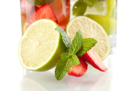Lime, strawberry and mint isolated on white backgroundの写真素材