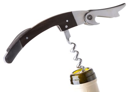 Corkscrew in a wine bottle. Isolated on white backgroundの写真素材