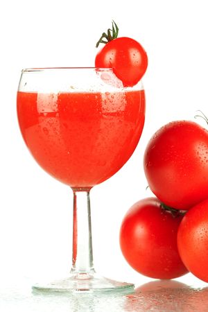 Fresh tomato juice with tomatosの写真素材
