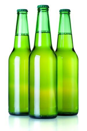 Beer collection - Three green beer bottles. Isolated on white backgroundの写真素材
