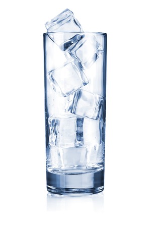 Glass with ice cubes. Isolated on whiteの写真素材