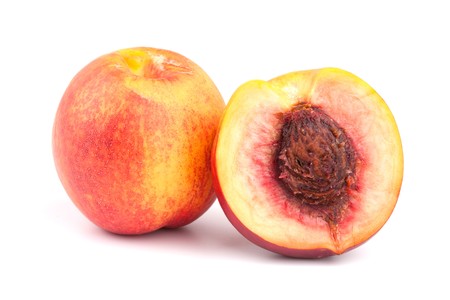 Fresh peaches isolated on white backgroundの写真素材