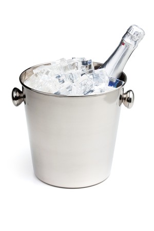 Champagne bottle in ice bucket. Isolated on whiteの写真素材