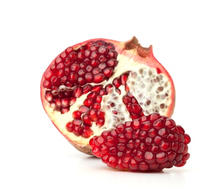 Red pomegranate fruit. Small DOF. Isolated on white backgroundの写真素材