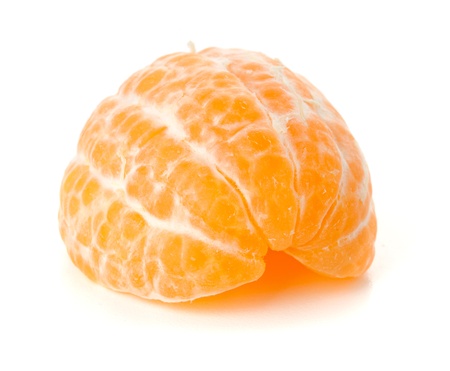 Ripe tangerine segments. Isolated on whiteの写真素材