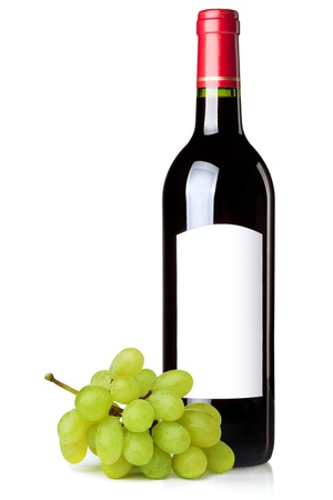Red wine in bottle with blank label and green grapes branch. Isolated on white backgroundの写真素材