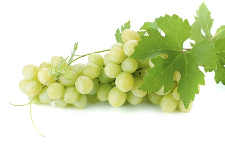White grapes with leaves. Isolated on white backgroundの写真素材